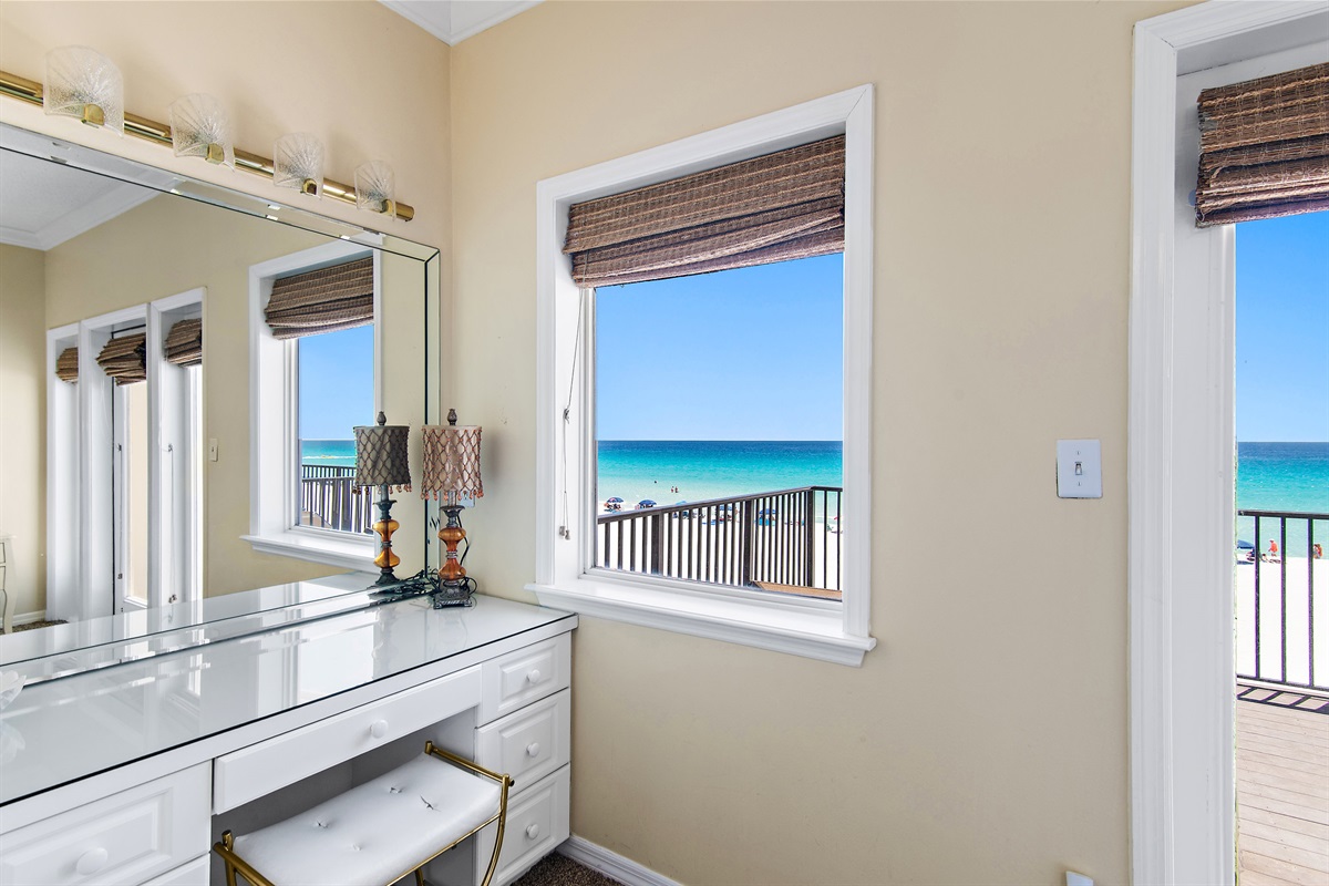 SPACIOUS Master Bedroom features a King Bed, Workspace, and BIG Gulf Views off of the 3rd Floor Private Balcony