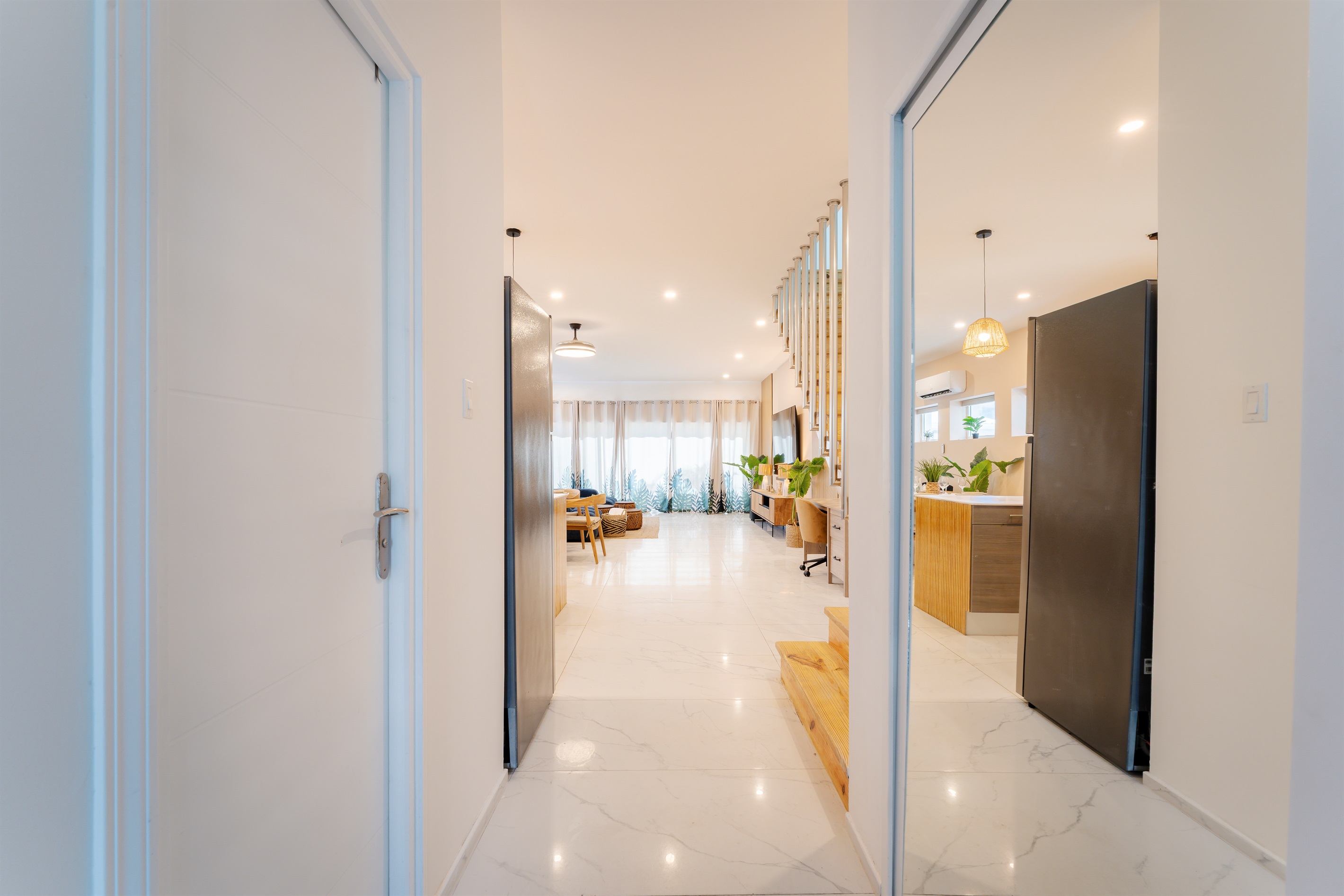 Secure smart lock access leads into a bright, welcoming foyer
