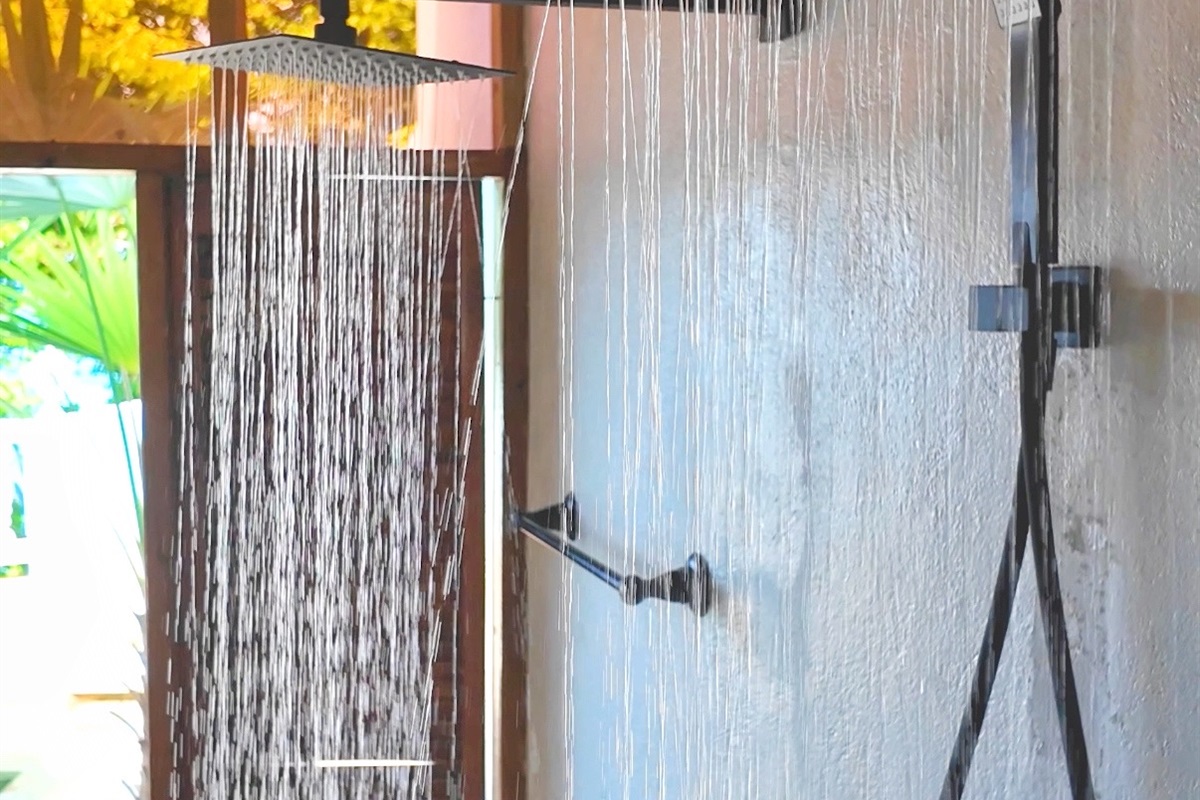 Dual showers off of the primary bathroom that leads straight out to the hot tub. There is door that can be closed for privacy.