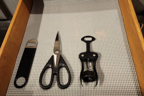 Bottle opener, scissors, and a wine bottle opener. 