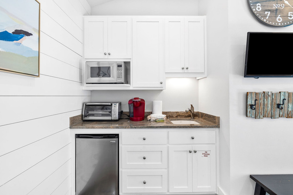 Convenient kitchenette - perfect for quick breakfasts, snacks, and morning coffee before heading to the beach.