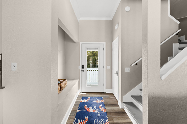 Two bedrooms are located upstairs.