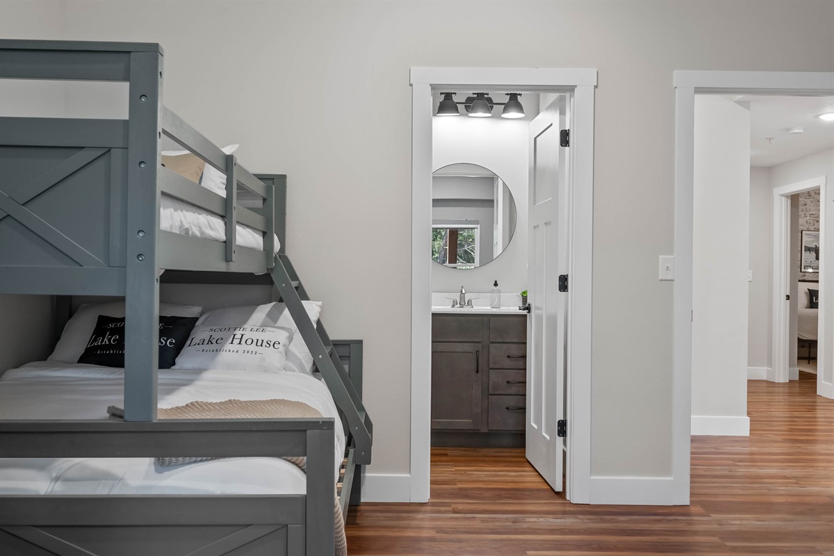 Bunk room. Laundry room is located in the hall just off this room.