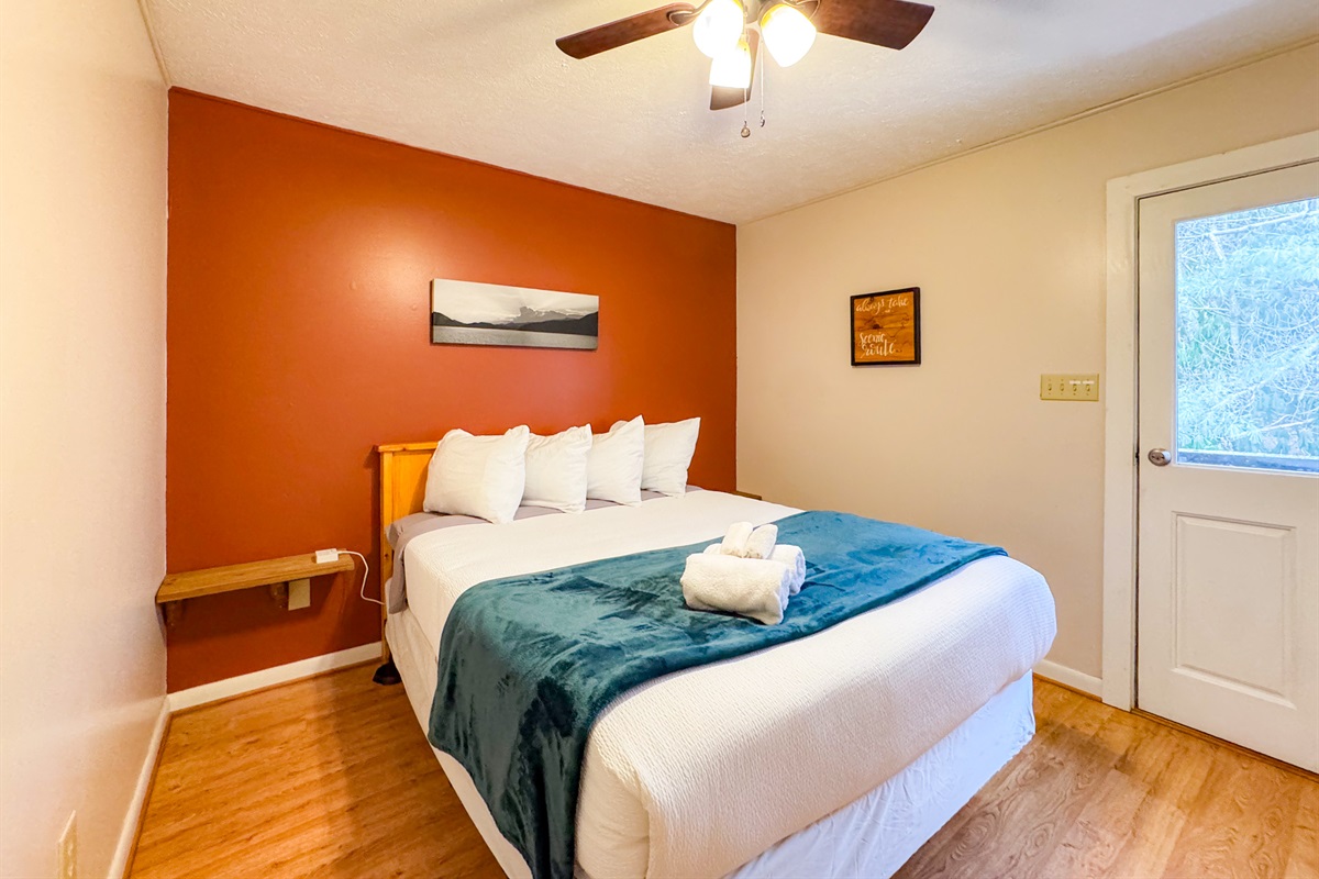 upstairs bedroom complete with a hybrid memory foam queen bed and shredded bamboo pillows