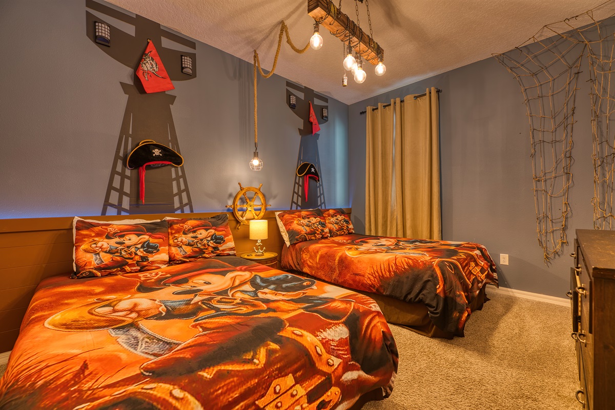 Bedroom 5 is Mickey’s Pirate room w/ two double beds and a fun place to play!