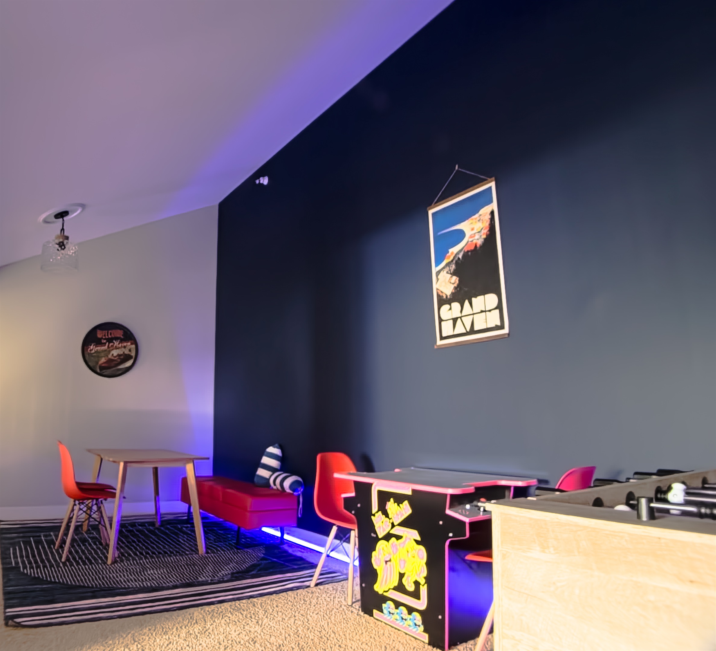Game room with Foosball, arcade, and board games