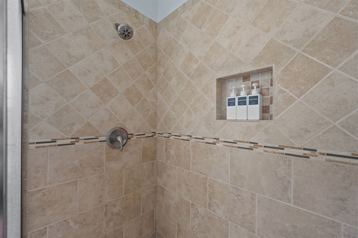 Little elevated touches make all the difference- like dual shower heads in the master walk in shower with essentials like shower soaps provided in each bathroom 
