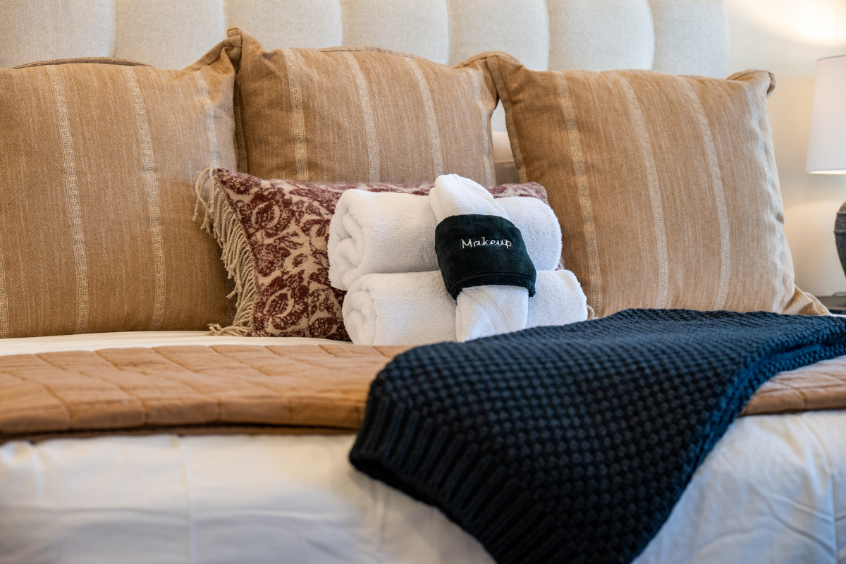 Soft bedding and cozy finishing touches make settling in for the night feel especially inviting.