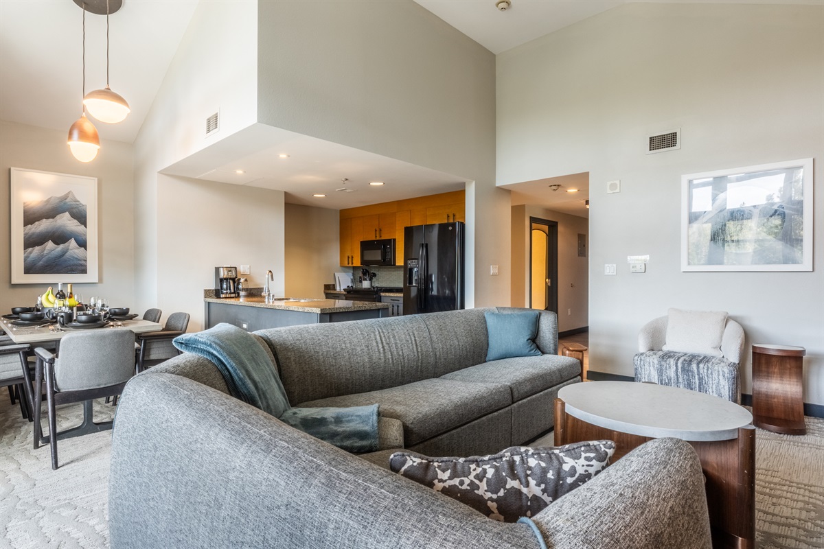 The queen sleeper sectional's additional sleeping space in the living area allows flexibility for families or small groups.