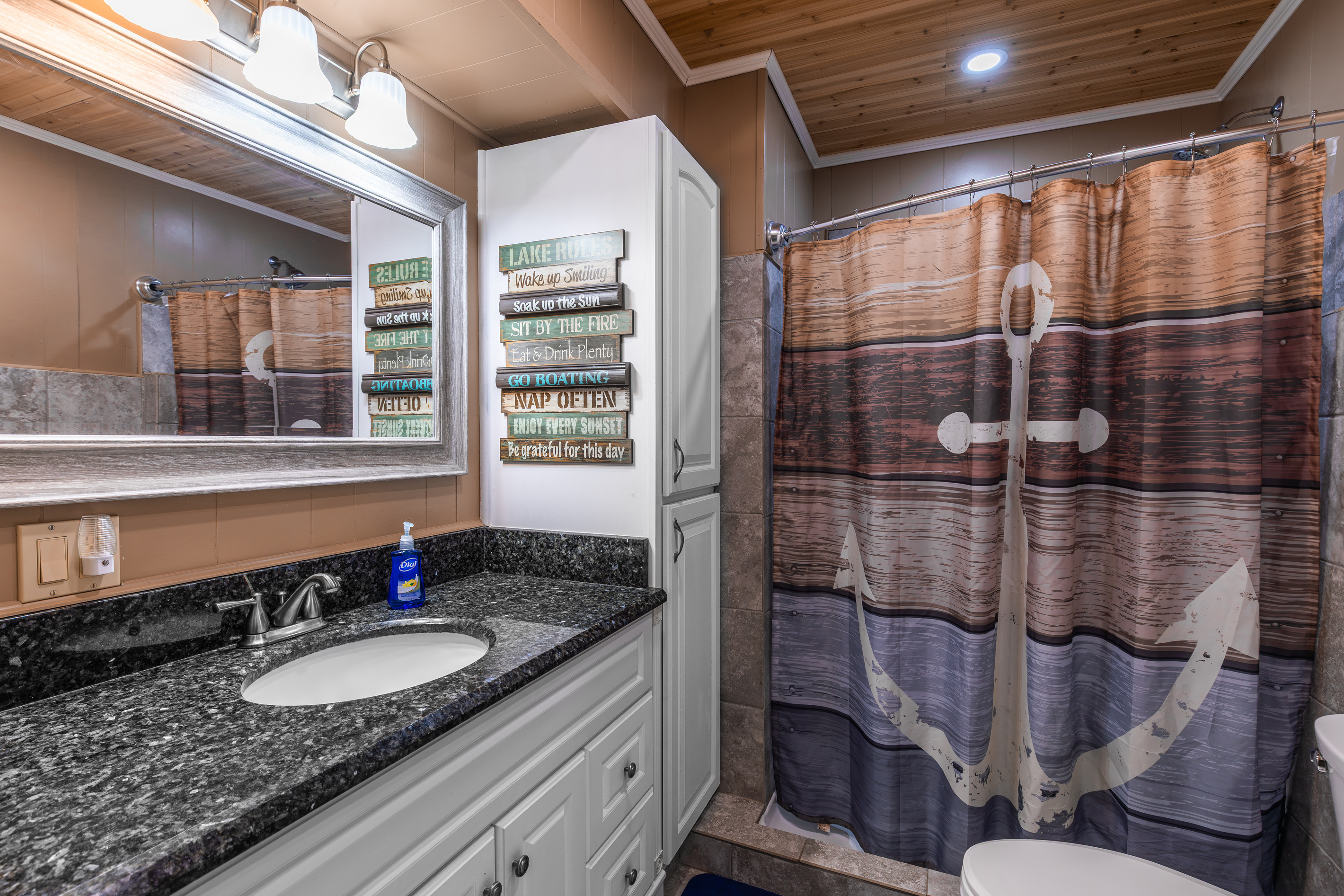 The full bathroom is clean, bright, and stocked with towels and everyday essentials for your stay.
