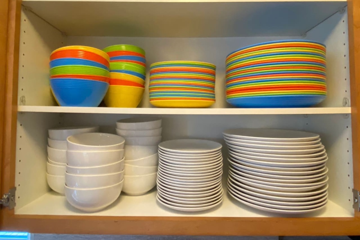 Set of 24 indoor dinnerware and set of 24 outdoor dinnerware provided.