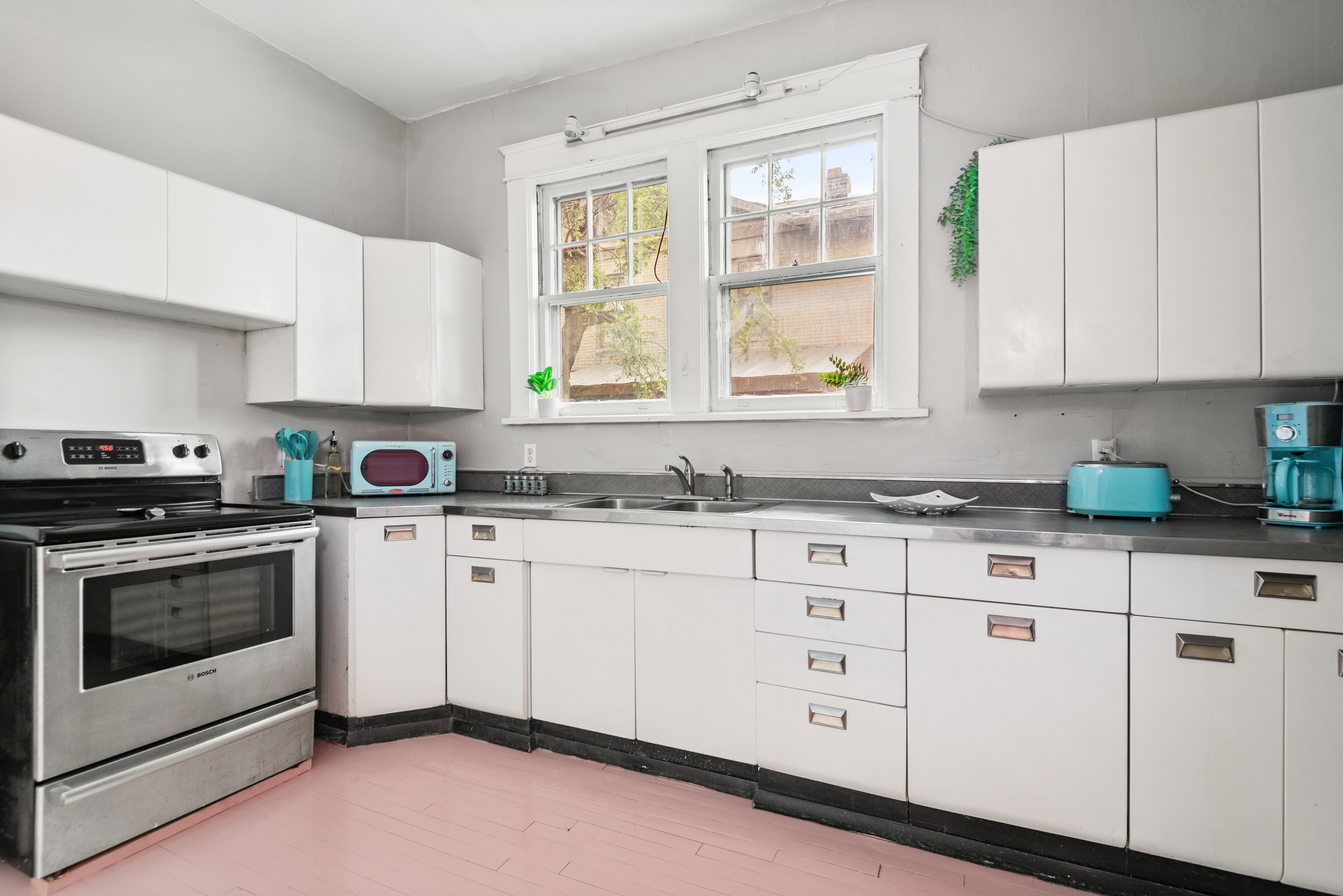 Great lighting with vintage metal cabinets