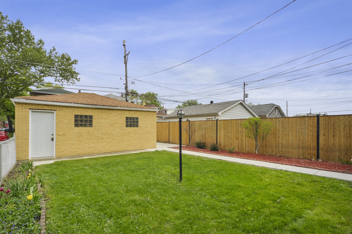 The backyard is shared between 3 apartments.