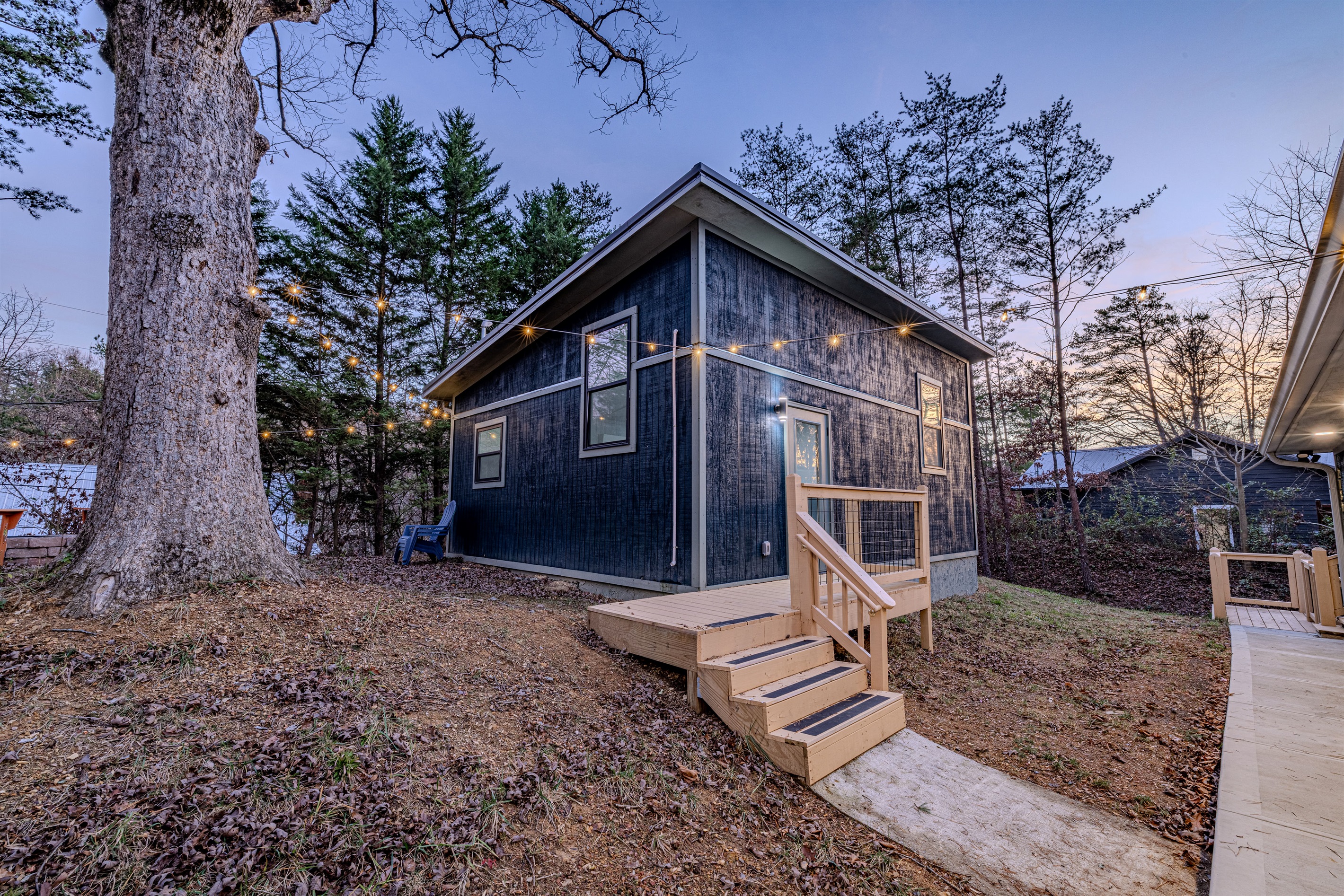 Enjoy a bird's-eye view of your private mountain retreat, highlighting the spacious outdoor decks and serene wooded setting.