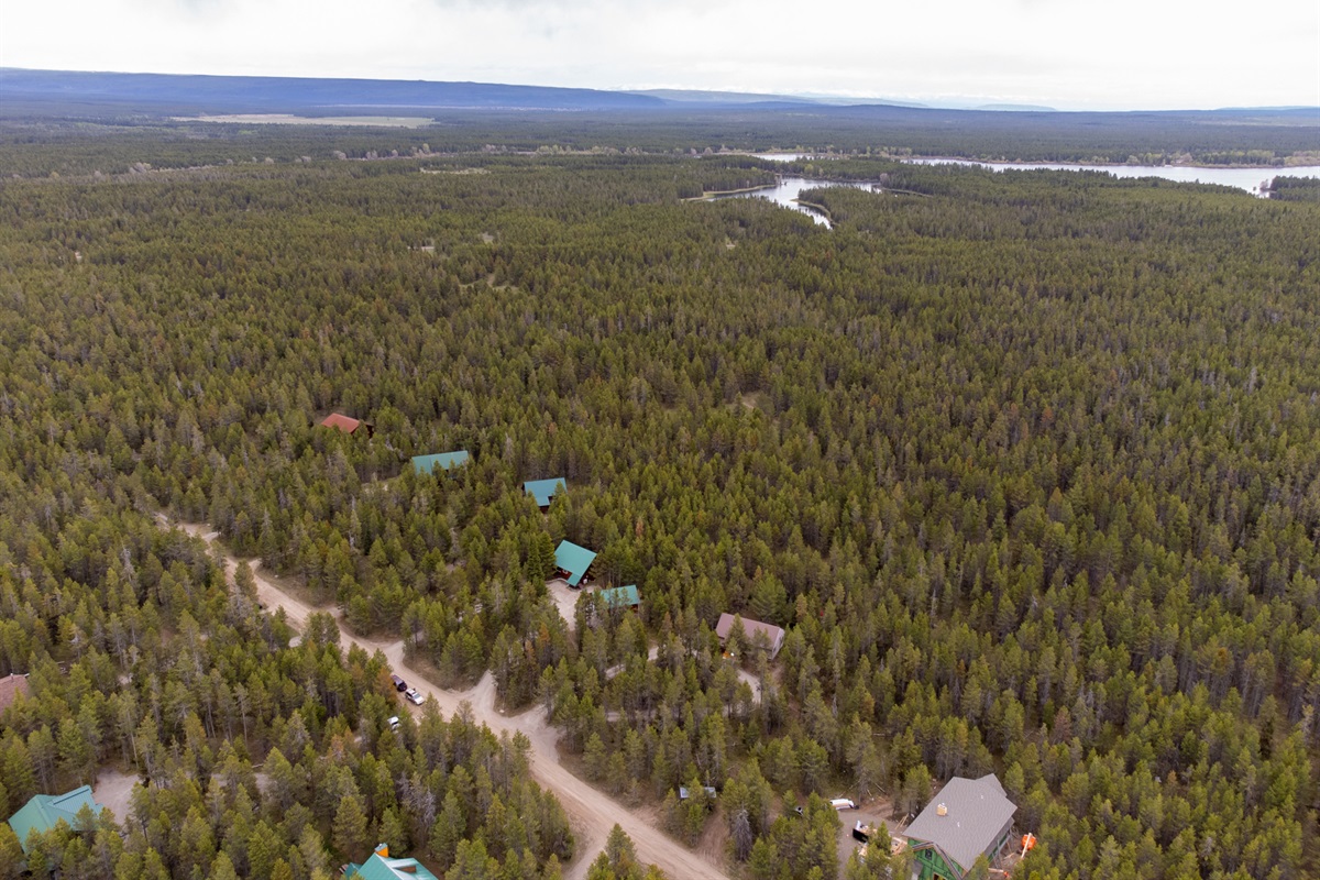 Drone View to Island Park Reservoir fro the cabin with green roof