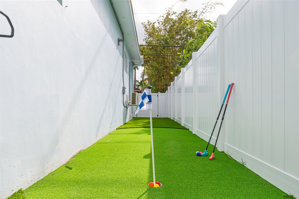 Your own side-yard mini putting green adds a fun activity for the whole family. Clubs and balls included.