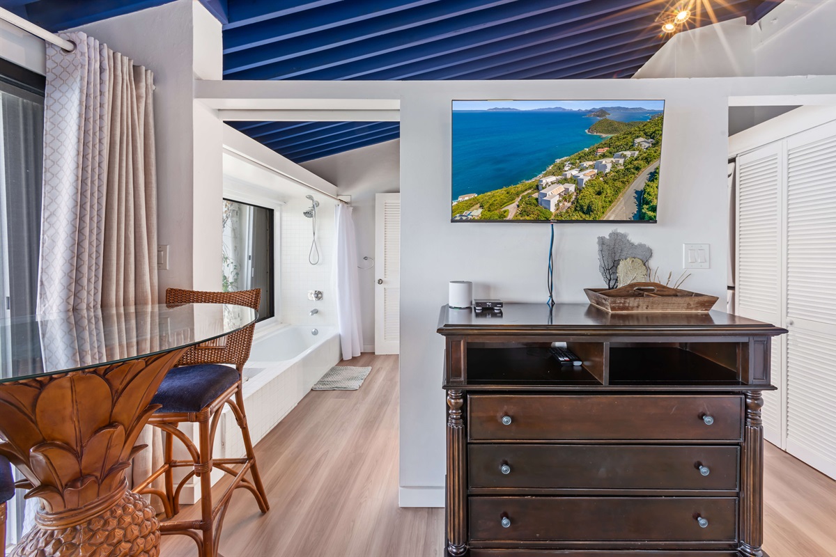 Ensuite primary bathroom; Spa-inspired ensuite with modern fixtures and ocean views from the shower.