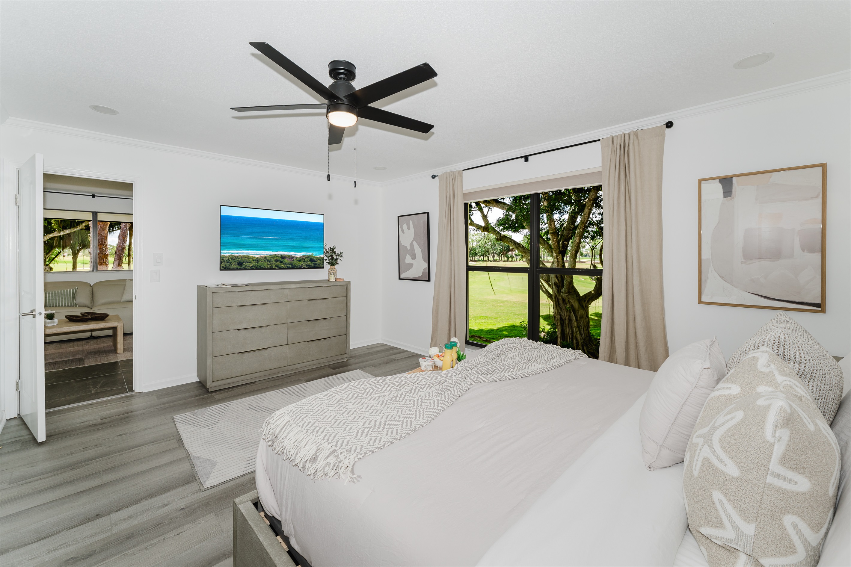 Spacious primary suite with a comfortable king bed and a serene atmosphere. Relaxing retreat designed for restful nights and peaceful mornings. Thoughtfully designed bedroom with hotel-quality comfort