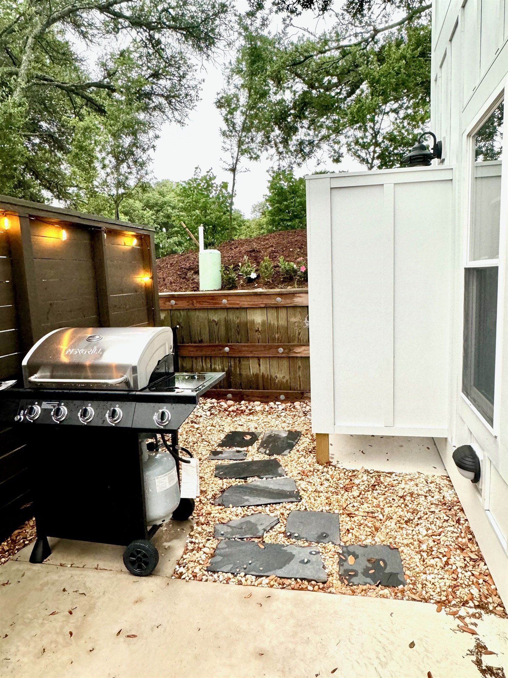 Grill, outdoor showerEnd unit has more privacy, shade, natural views
