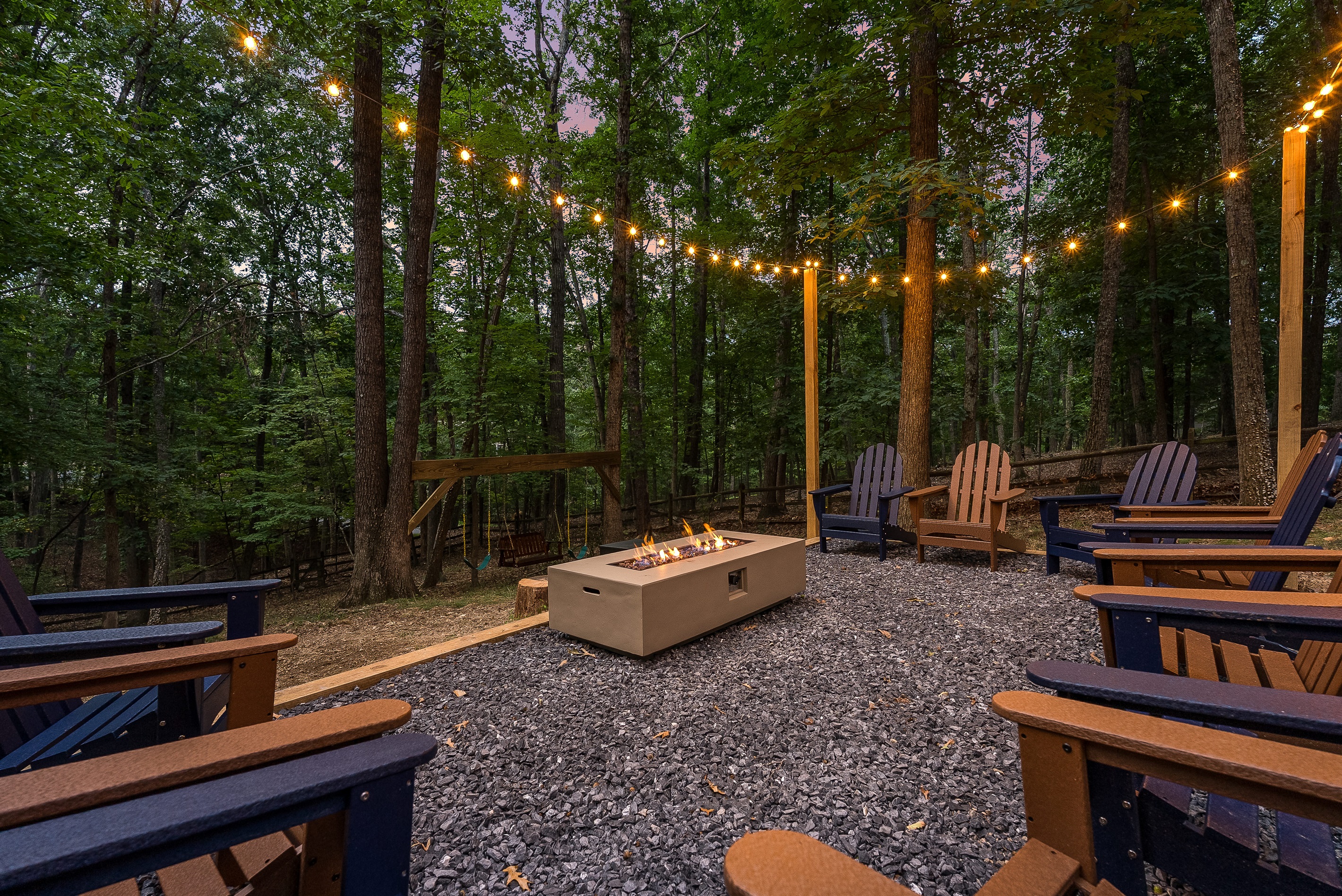 Gather ‘round the fire pit under string lights for s’mores, stories, and stargazing