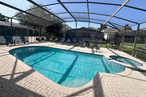 view of pool with new chairs and sun loungers 2025

