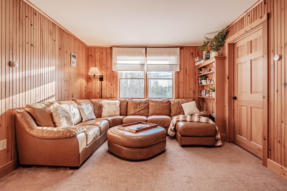 The living room- A cozy space to curl up, relax, and enjoy time together.