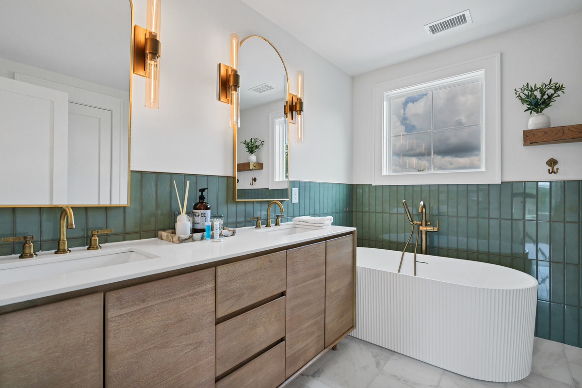 Main Bedroom Bath with Soaker Tub and Double Vanities, marble floor, Tile Wainscotting