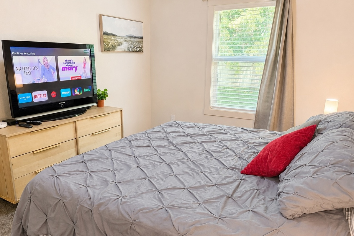 Wind down in the evening with this large screen TV hooked up to Apple TV for Netflix, Prime Video and local stations.