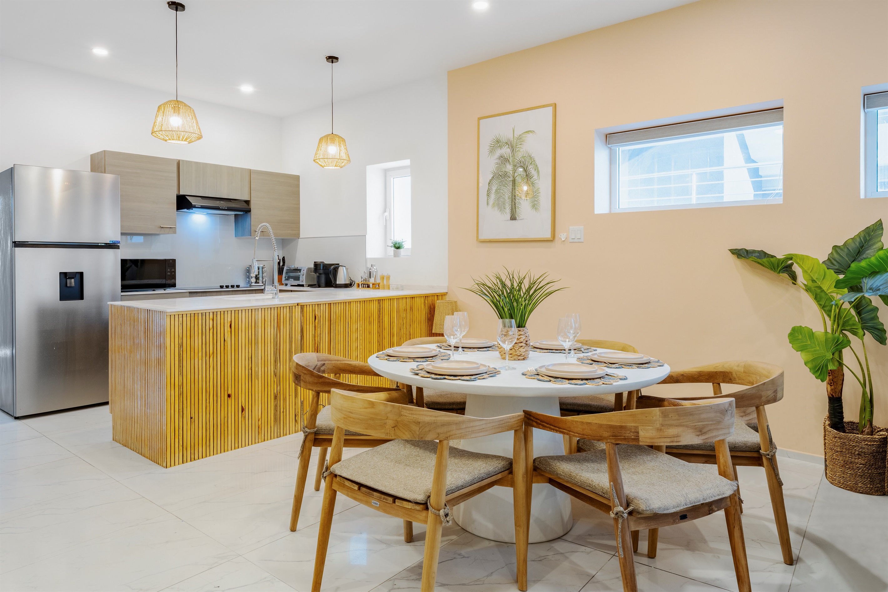 A chic round table setting for family meals or takeout from nearby Maho restaurants