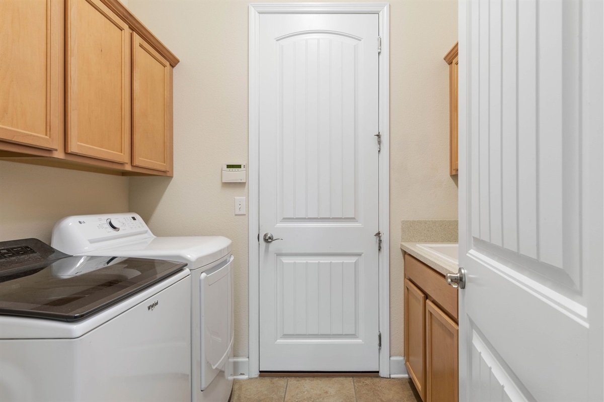 Toss in sandy towels, freshen up swimsuits, and reset for tomorrow's adventure. This dedicated laundry room keeps beach days easy, packing lighter, and family vacations feeling a whole lot more effortless.