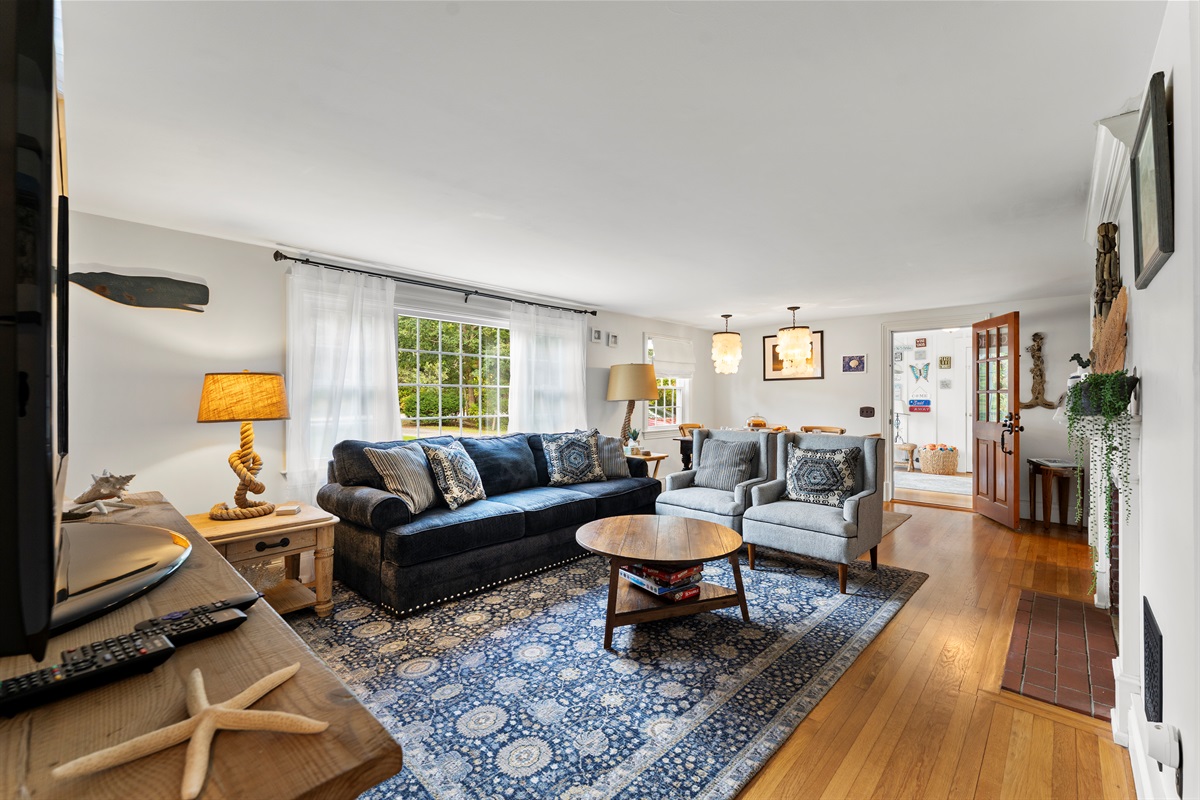 Relax, watch, and unwind in the spacious living room.