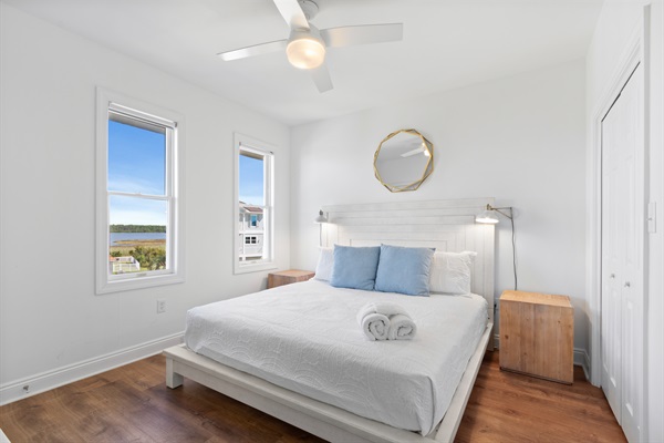 On the front left side of the home is a 2nd King bedroom.