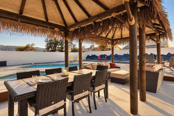 Dinner outside under the palapa, with seating for the whole group beside the private pool