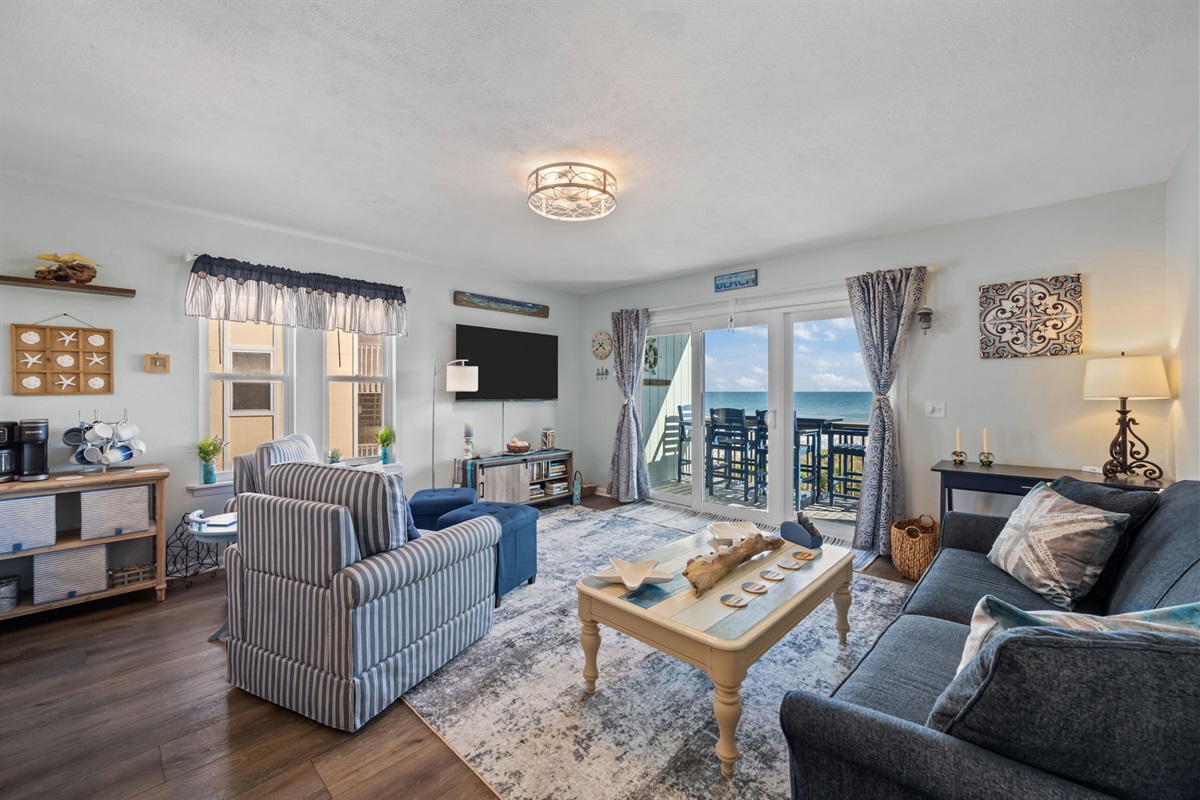 A bright, airy space where coastal decor and natural light create a relaxed beach vibe