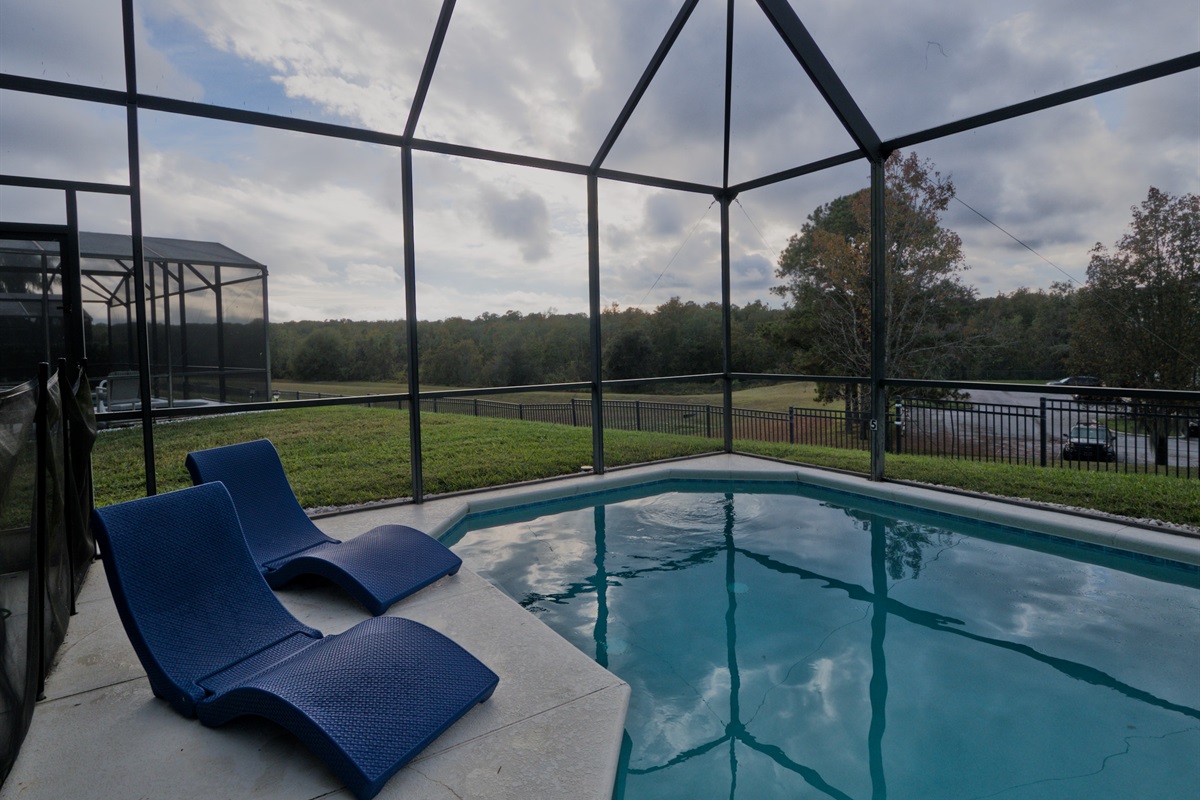 Private screened pool and jacuzzi.