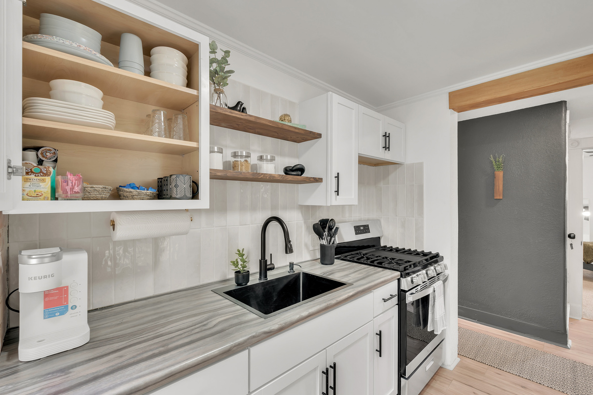 Stocked with dishes and (disposable for convenience). We thought of everything.