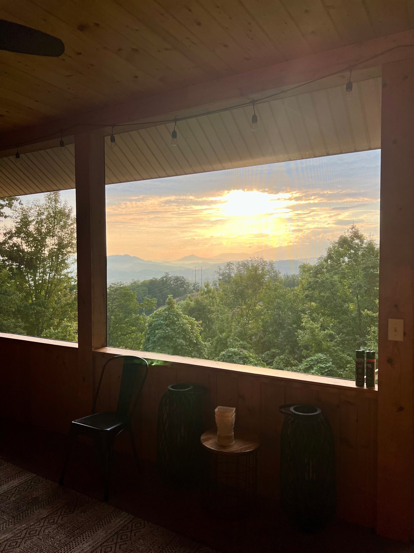 Enjoy gorgeous sunrises and sunsets from the screened- in porch area