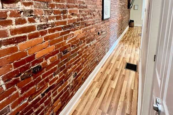 Cozy hallway leading to the bedrooms, offering a seamless flow through the space.