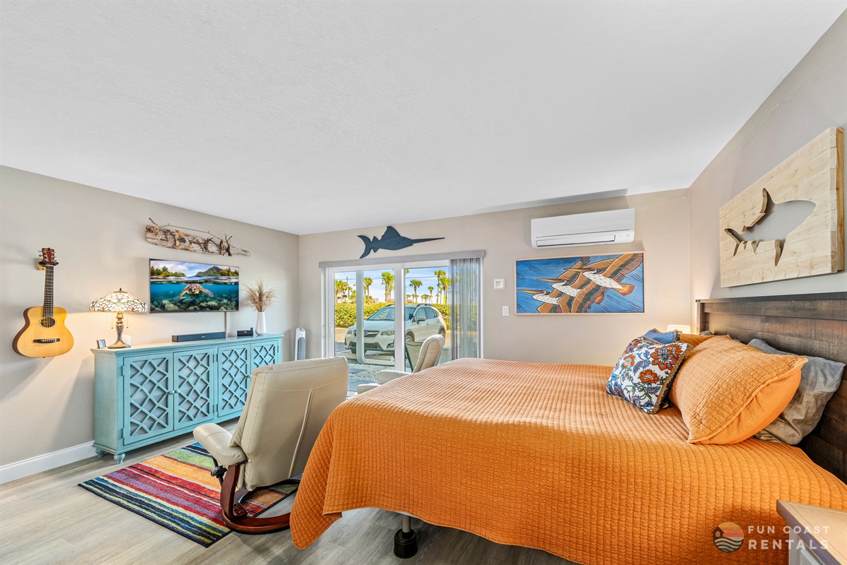 King Bed and Living Room Area
