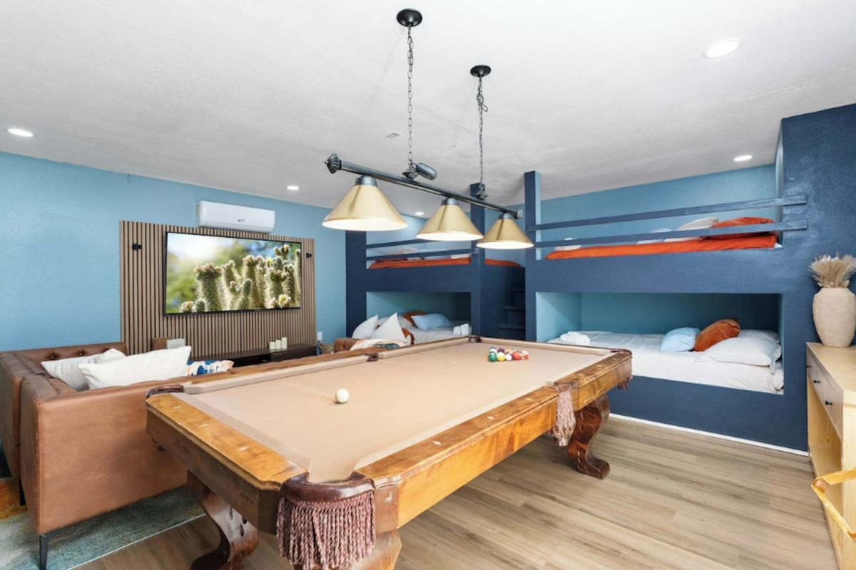 Custom bunk game room with pool table.