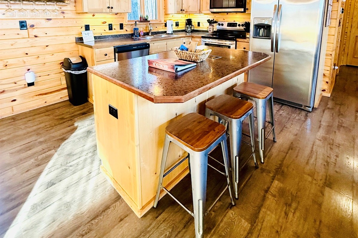 Our kitchen with large center island has everything you need.