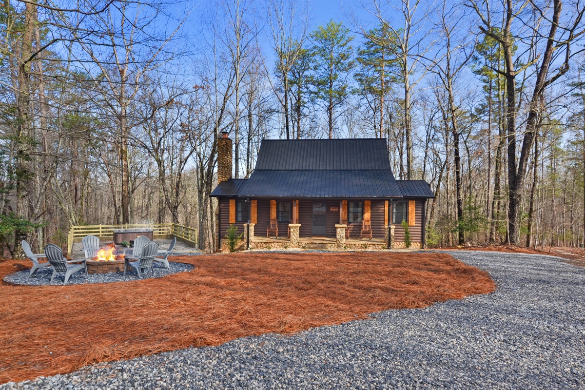 Front entrance w/ hot tub on the side of the home