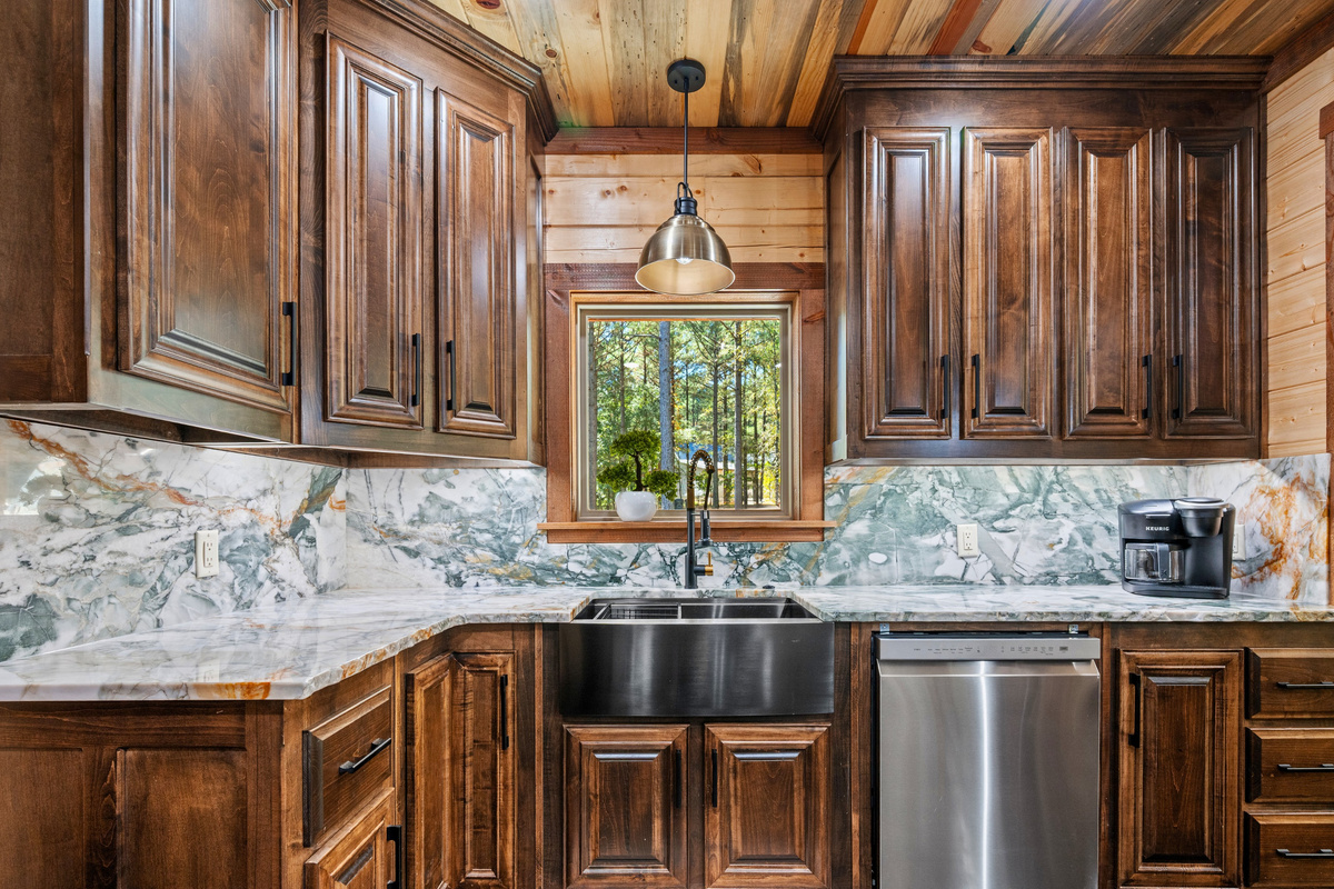 Modern kitchen with plenty of counter space and rustic style.