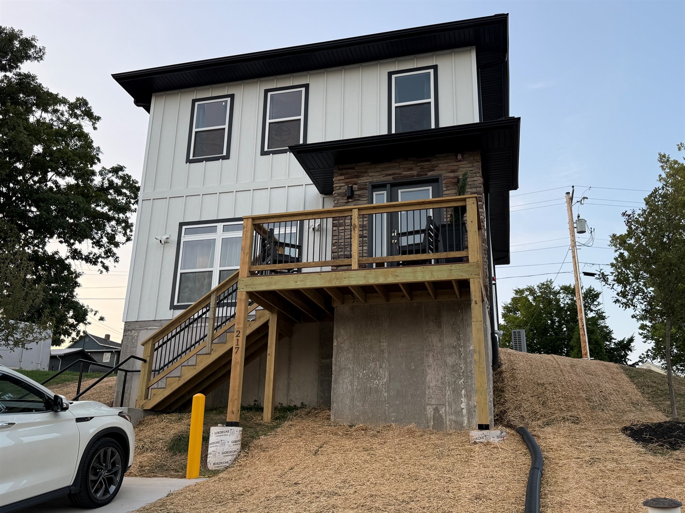 Front elevation of home with stone and board/batten siding. Home has over 2400 square feet of vacation space. This is great for family gatherings. 