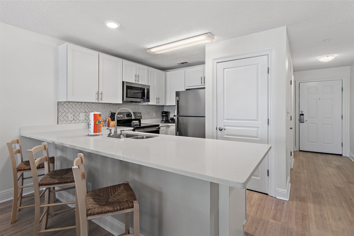 Enjoy preparing home cooked meals in this Remodeled and fully-stocked kitchen while overlooking the shimmering Gulf of Mexico!