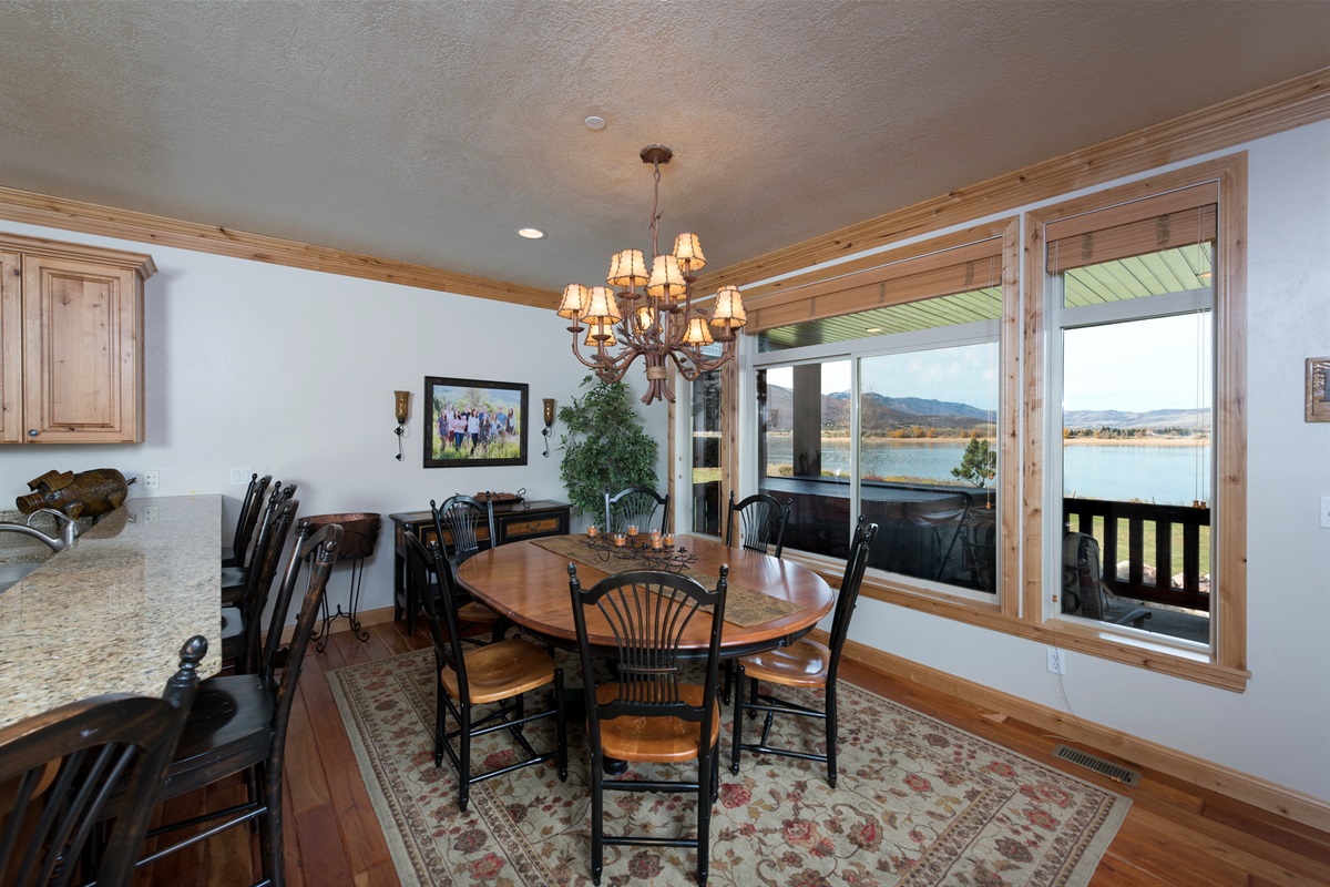 Dining area with panoramic lake views—enjoy every meal with a breathtaking backdrop.