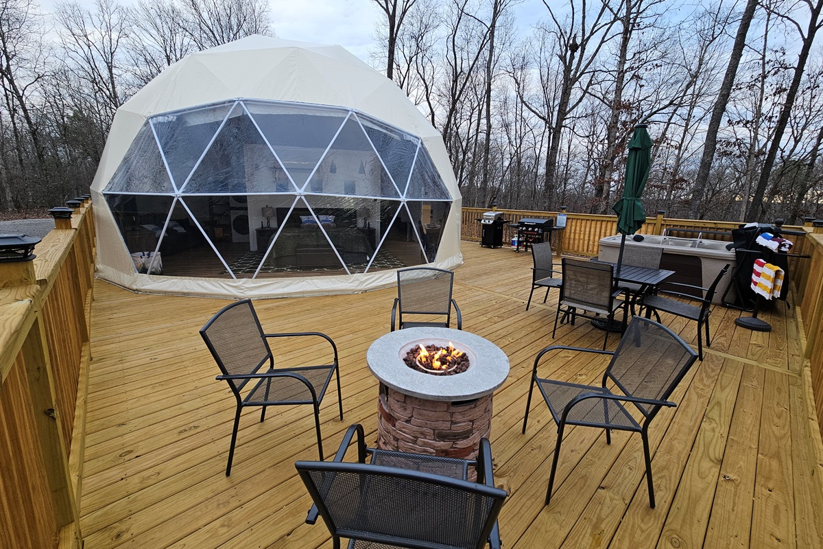 Gather by the fire, soak under the stars, and savor the forest air