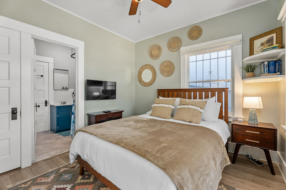 Bedroom with a queen bed, boho decor