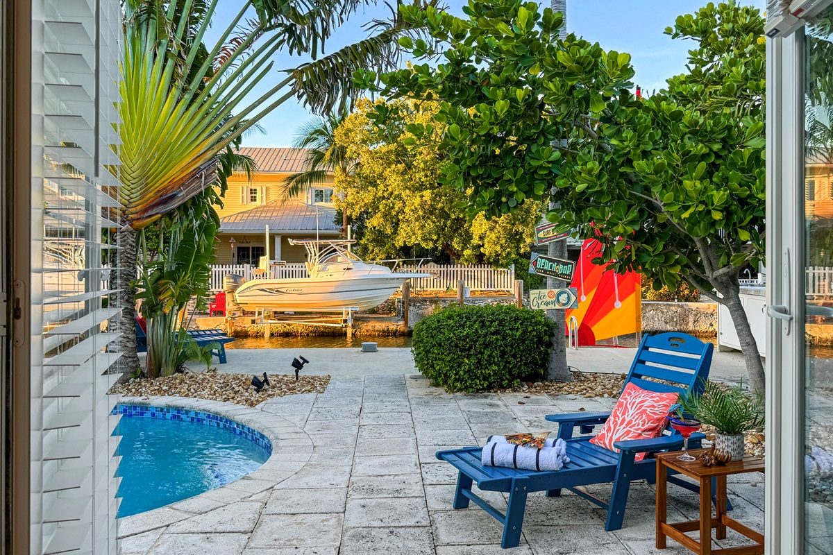 The master bedroom boast an enviable view thru it's french doors