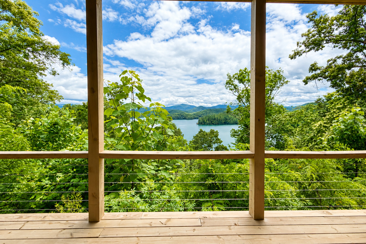 A view worth slowing down for.
Take in sweeping views of Lake Santeetlah and the surrounding mountains from the spacious deck at Hidden Point House.